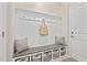 Mudroom features a bench with storage cubbies, perfect for organizing belongings at 150 Gosford Ln, Garner, NC 27529