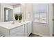 Bright bathroom featuring a double sink vanity with contemporary fixtures and ample counter space at 16 Powder Ct, Angier, NC 27501