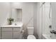 Bright bathroom featuring a vanity, toilet, and shower at 16 Powder Ct, Angier, NC 27501