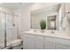 Bathroom with walk-in shower and double sink vanity at 16 Powder Ct, Angier, NC 27501