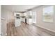 Bright kitchen features stainless appliances, a functional island, and ample cabinet space at 16 Powder Ct, Angier, NC 27501