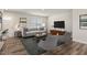 Inviting living room with hardwood floors and neutral decor at 16 Powder Ct, Angier, NC 27501