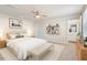Serene main bedroom with a luxurious bed, stylish décor, and attached bath at 16 Powder Ct, Angier, NC 27501