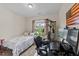 Well lit bedroom with home gym equipment, allowing for comfortable workouts at 16 Woodglen Dr, Clayton, NC 27527