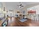Bright living room offers ample seating, hardwood floors, and an open design at 16 Woodglen Dr, Clayton, NC 27527
