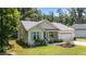 Charming single-Gathering home with manicured lawn and inviting curb appeal, a perfect blend of comfort and style at 174 Sequoia Dr, Louisburg, NC 27549