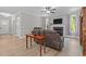 The living room offers a fireplace, natural light, and neutral tones at 174 Sequoia Dr, Louisburg, NC 27549