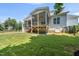 Spacious backyard featuring a screened porch and well-maintained lawn at 20 Delia Ln, Pittsboro, NC 27312