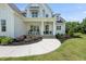 Charming home featuring a covered front porch, manicured lawn, and stone accents at 20 Delia Ln, Pittsboro, NC 27312