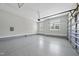 Clean and spacious garage with an epoxy floor, providing ample room for parking and storage at 20 Delia Ln, Pittsboro, NC 27312