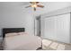 Bedroom featuring ceiling fan, carpet, and closet at 200 Woodvale Way, Fuquay Varina, NC 27526