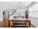 Open-concept dining area with hardwood floors and ample natural light at 200 Woodvale Way, Fuquay Varina, NC 27526