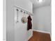 Hallway with coat rack and wood flooring at 200 Woodvale Way, Fuquay Varina, NC 27526