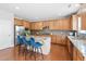 Well-appointed kitchen boasts stainless steel appliances, a large island, and ample cabinet space at 200 Woodvale Way, Fuquay Varina, NC 27526