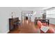 Open-concept living area featuring hardwood floors and seamless flow at 200 Woodvale Way, Fuquay Varina, NC 27526