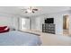 Large main bedroom features a ceiling fan, and access to the bath and multiple closets at 200 Woodvale Way, Fuquay Varina, NC 27526