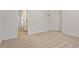 Bedroom with neutral carpet, a closet, and a doorway leading to a bathroom at 205 Mint Hill Dr, Cary, NC 27519