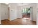 Dining room with chandelier and sliding glass doors that lead to deck at 205 Mint Hill Dr, Cary, NC 27519