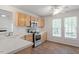Bright kitchen with stainless steel appliances, light wood cabinets, and tile flooring at 205 Mint Hill Dr, Cary, NC 27519