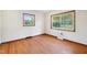 Bright bedroom featuring hardwood floors and large windows offering plenty of natural light at 2081 Stone Street Ext, Mebane, NC 27302