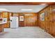 Spacious kitchen with knotty pine cabinets, modern appliances, and a view to the outside at 2081 Stone Street Ext, Mebane, NC 27302