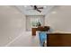 Bedroom with window, ceiling fan, and ample space for relaxation or a productive workspace at 2104 Brockfield Ct, Raleigh, NC 27614
