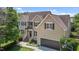 Charming two-story home with a well-maintained front yard, attached garage, and lovely curb appeal at 2104 Brockfield Ct, Raleigh, NC 27614