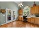 Bright kitchen featuring backyard views from a charming built-in desk area at 2104 Brockfield Ct, Raleigh, NC 27614