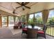 Inviting screened-in porch with seating, a ceiling fan, and open-air enjoyment at 2104 Brockfield Ct, Raleigh, NC 27614