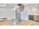 Finished basement boasts a spiral staircase, wet bar, and access to the outside providing convenience at 2203 University Dr, Durham, NC 27707