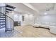 Finished basement with a spiral staircase, wet bar, and a cozy seating area for entertaining at 2203 University Dr, Durham, NC 27707