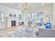 Cozy living room showcasing fireplace, neutral decor, recessed lighting, and hardwood floors at 2203 University Dr, Durham, NC 27707