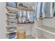 Walk-in closet provides ample storage with shelving and hanging racks at 3007 Shopton Dr, Apex, NC 27502