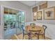Cozy dining area with sliding doors that lead to the outdoor patio at 3007 Shopton Dr, Apex, NC 27502