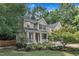 Charming two-story home with a welcoming front porch and meticulously landscaped yard at 3007 Shopton Dr, Apex, NC 27502