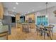 Bright eat-in kitchen featuring stainless appliances, granite counters, and a center island with seating at 3007 Shopton Dr, Apex, NC 27502