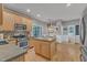 Well-equipped kitchen with an island and stainless steel appliances at 3007 Shopton Dr, Apex, NC 27502