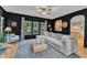 Inviting living room featuring neutral décor, hardwood floors, and natural light at 3007 Shopton Dr, Apex, NC 27502