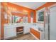 Bright bathroom with a large mirror, double sinks, soaking tub, walk-in shower, and stylish fixtures at 302 Caraway Ln, Cary, NC 27519
