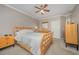 Comfortable main bedroom with ceiling fan, neutral walls, and furnishings at 302 Caraway Ln, Cary, NC 27519