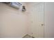 Empty walk-in closet with storage shelves ready to be organized in a home at 302 Caraway Ln, Cary, NC 27519