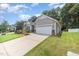 Charming single-story home with a well-manicured lawn and a two-car garage at 3037 Willow Ranch Dr, Fuquay Varina, NC 27526