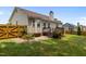 This home features a well-manicured backyard with a wooden patio at 304 Quailwood Dr, Fuquay Varina, NC 27526