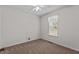 A bedroom with carpet, a ceiling fan, and a window at 304 Quailwood Dr, Fuquay Varina, NC 27526