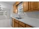 A view of the kitchen featuring shaker cabinets and stainless steel appliances at 304 Quailwood Dr, Fuquay Varina, NC 27526