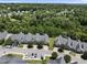 Aerial of well-kept townhomes with assigned parking at 3207 Imperial Oaks Dr, Raleigh, NC 27614