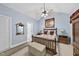 Bedroom with ceiling fan, side tables, and carpeted floors at 3207 Imperial Oaks Dr, Raleigh, NC 27614