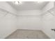 Walk-in closet with ample shelving, offering plenty of room for organized storage and a tidy wardrobe at 3401 Grosbeak Way, Raleigh, NC 27616