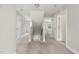 Hallway with carpeted floor and white doors at 3401 Grosbeak Way, Raleigh, NC 27616