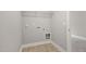 Practical laundry room featuring tile floor and washer/dryer hookups that provide convenience at 3401 Grosbeak Way, Raleigh, NC 27616